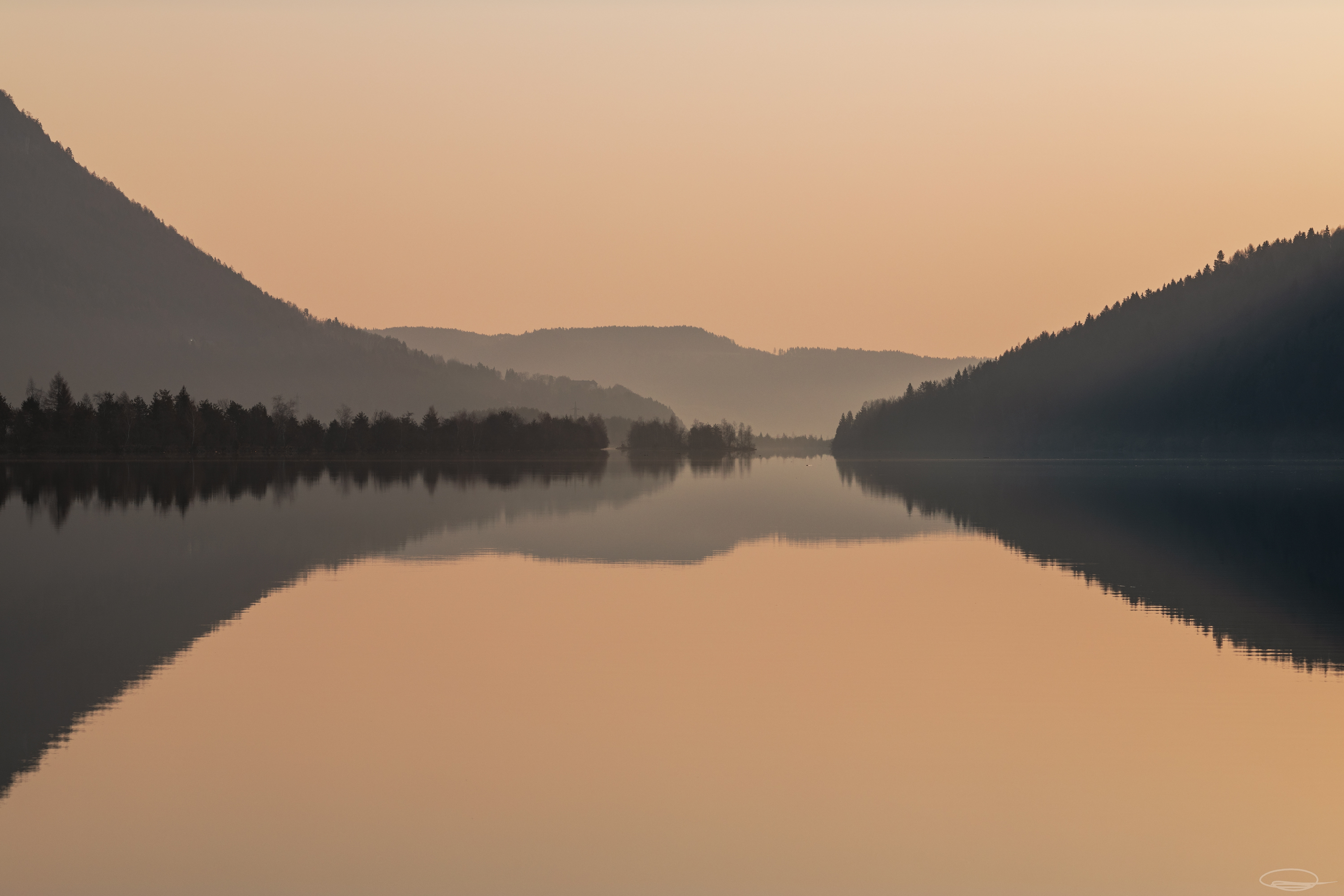 Sunrise at a calm lake