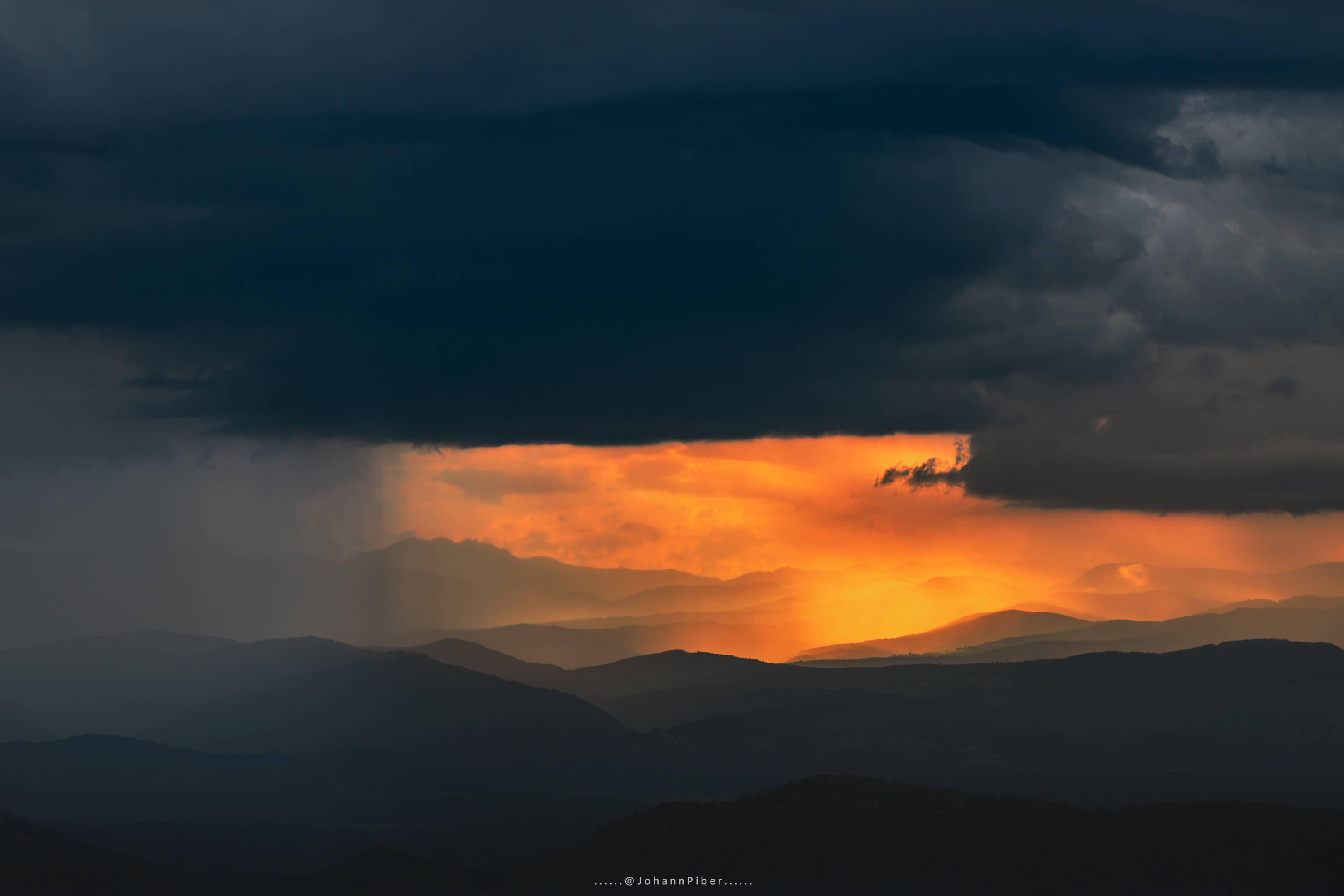 Sunset vs Storm - Carinthia, Austria